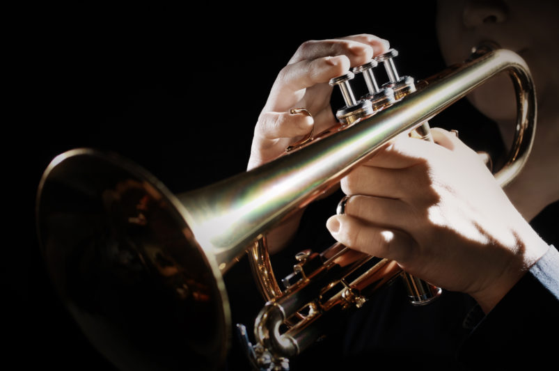 woman playing cornet